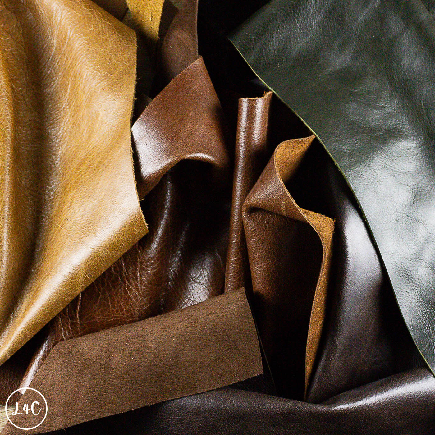Close-up of various leather textures in brown and black.