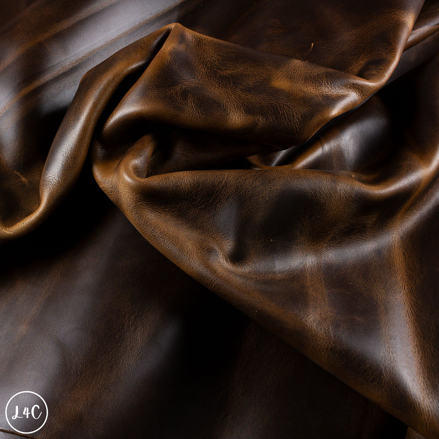 Close-up of brown leather fabric with visible texture
