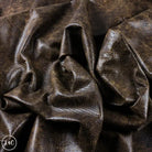 Distressed Antique Brown, Snake Print Textured Leather close up