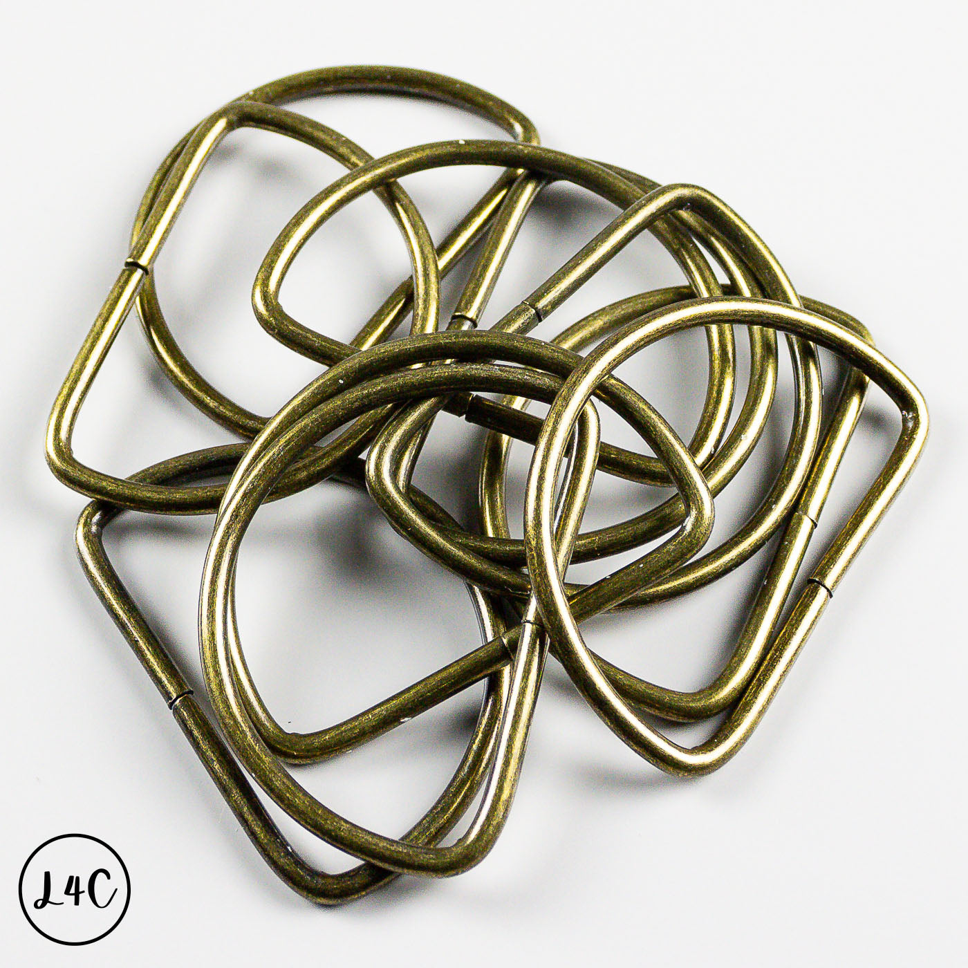 Bronze metal rings on a white background