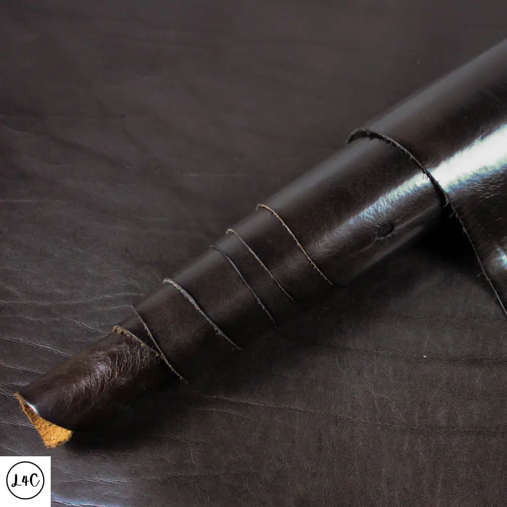 Ebony Veg Tan Leather rolled close up
