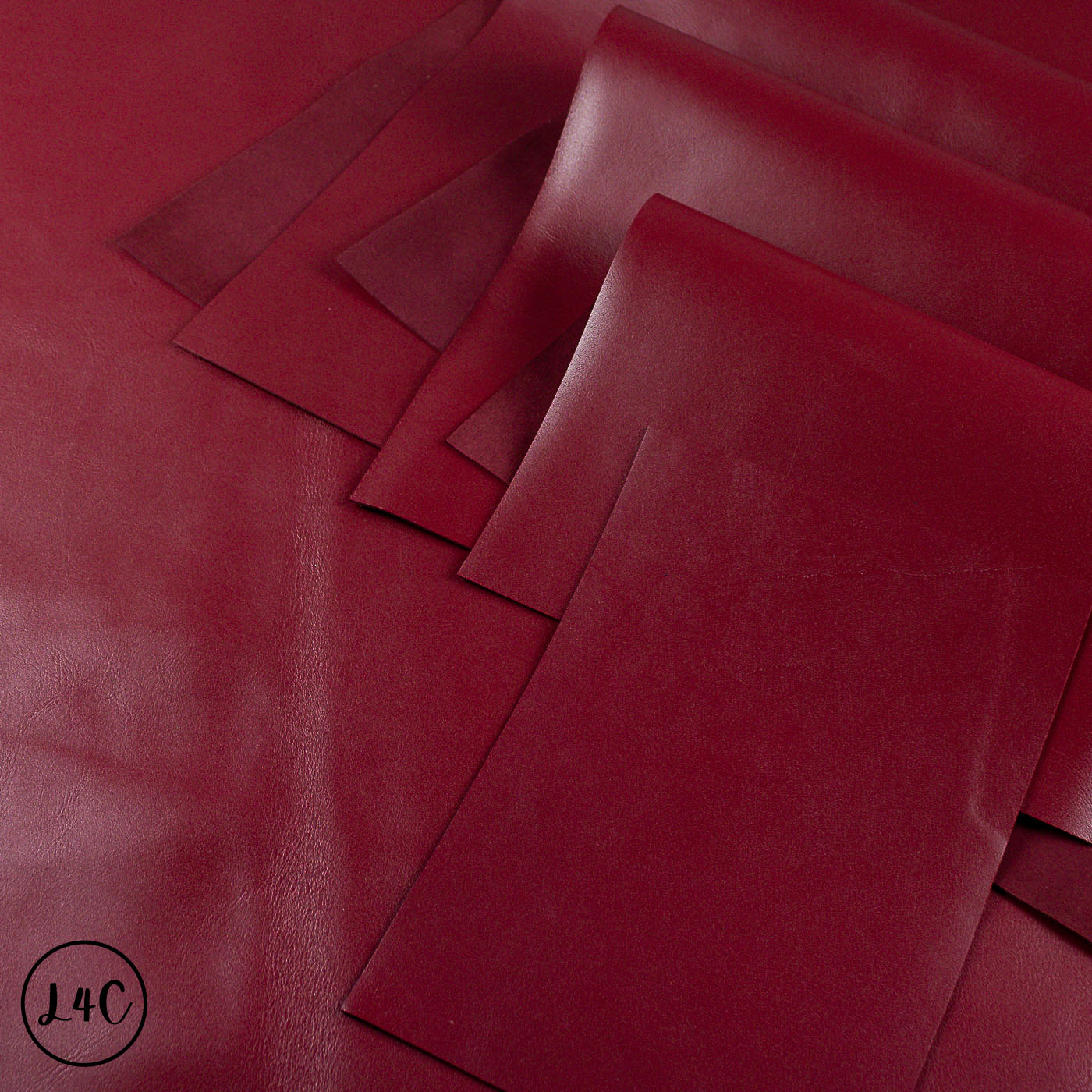 Red leather panels arranged on a red background.