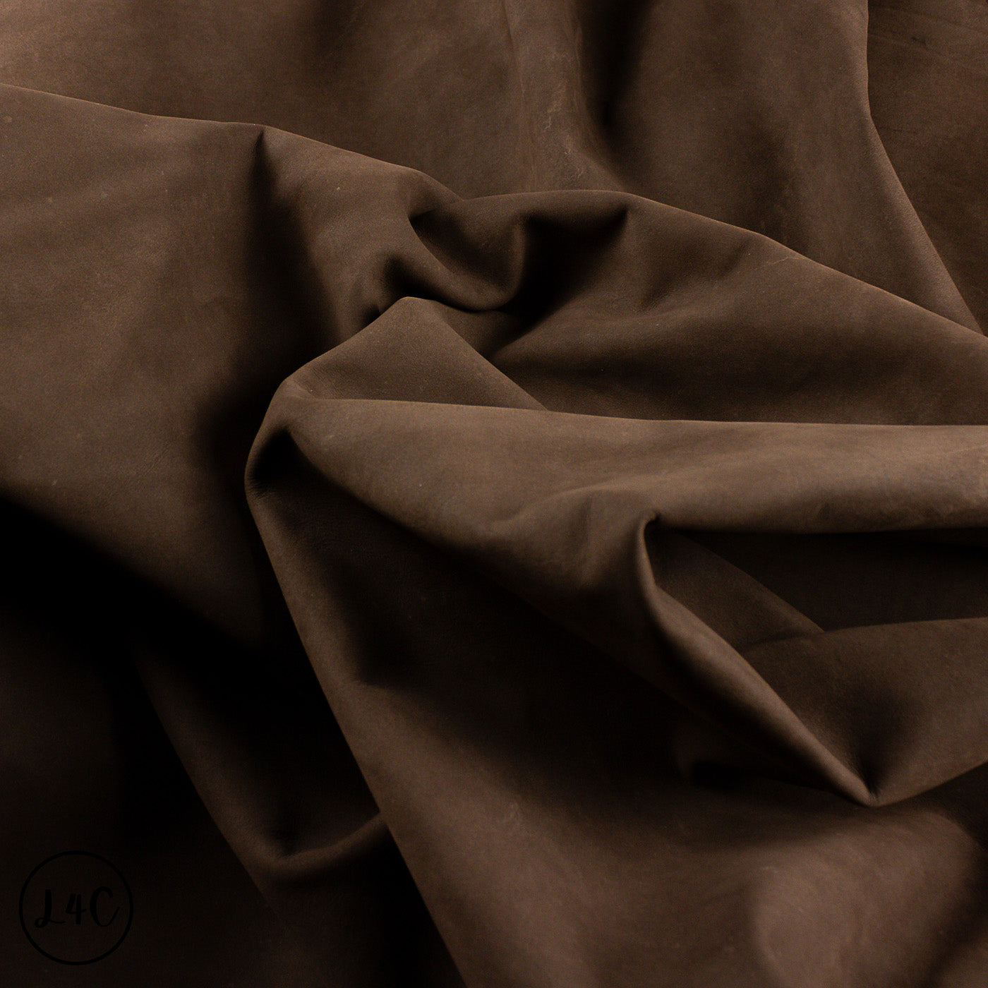 Close-up of brown leather with folds