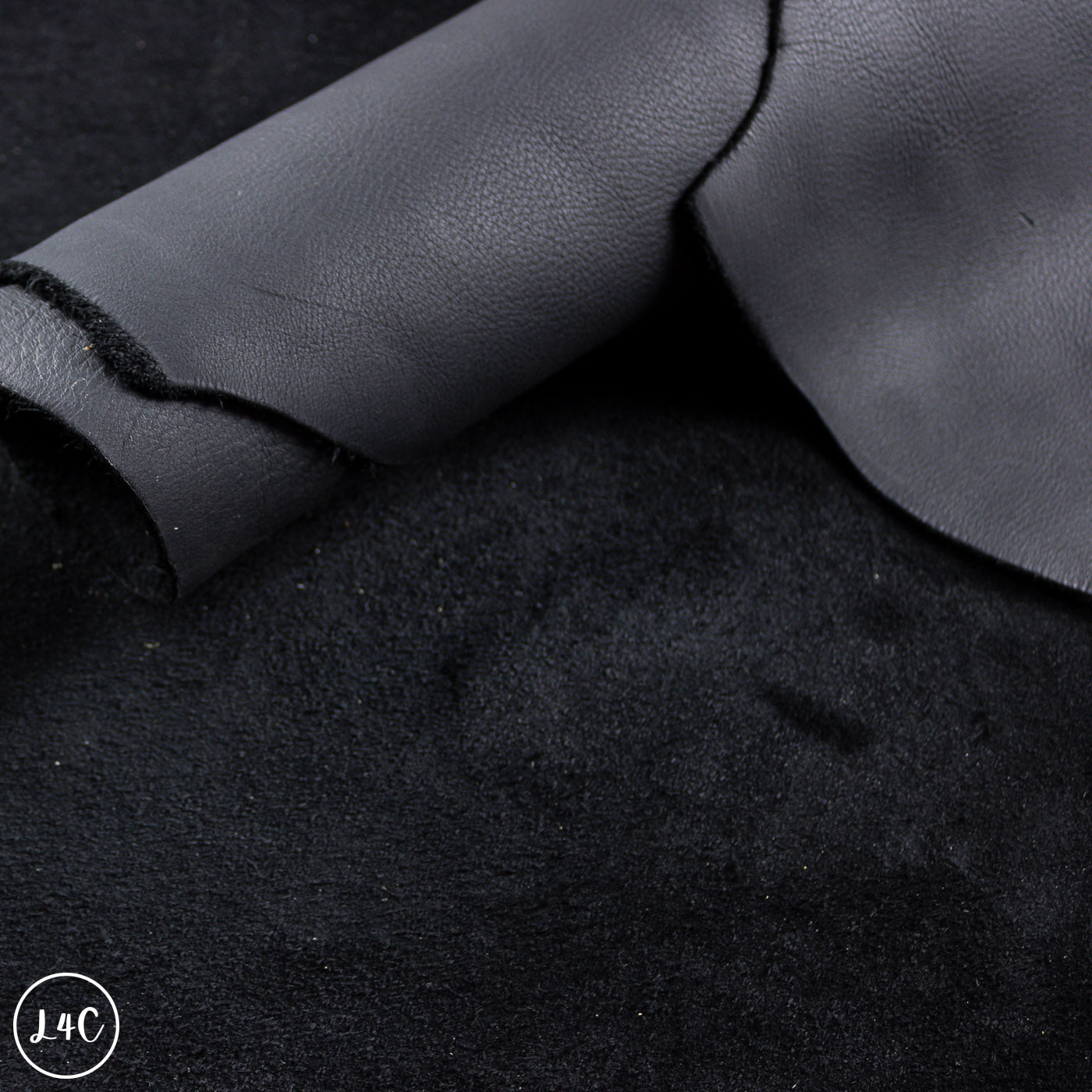 Close-up of black leather with visible texture