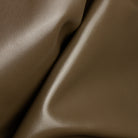 Close-up of taupe leather with a soft texture
