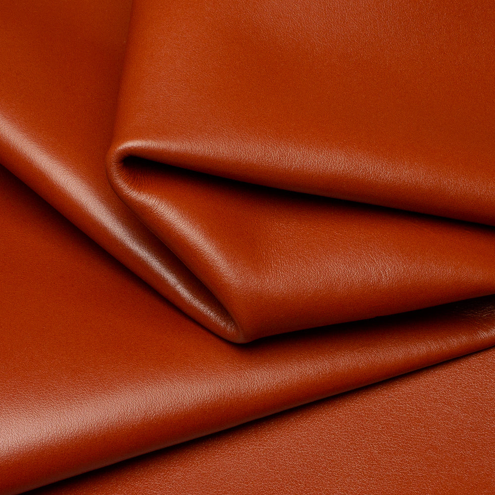 Close-up of brown leather with folds
