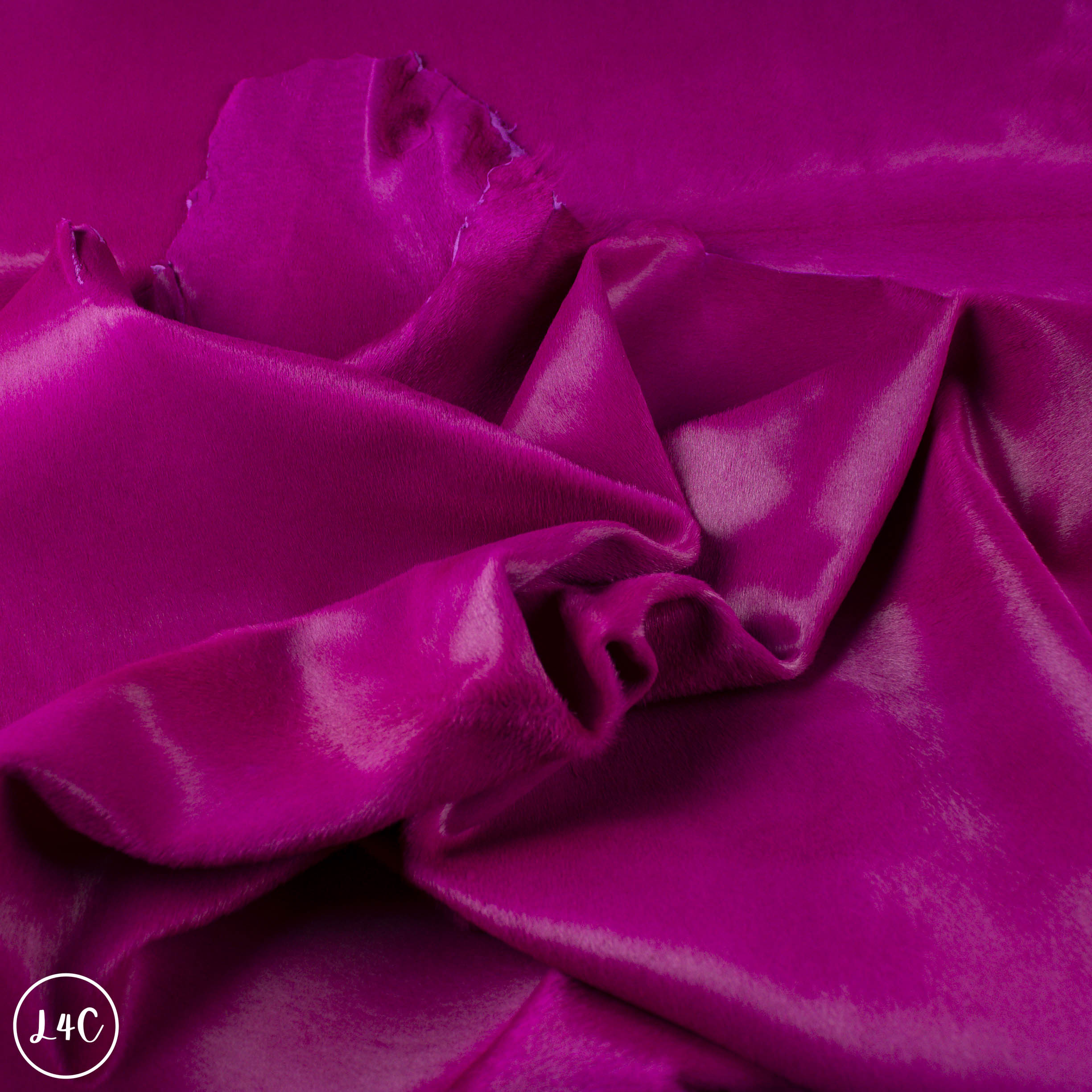 Close-up of purple leather with a glossy finish