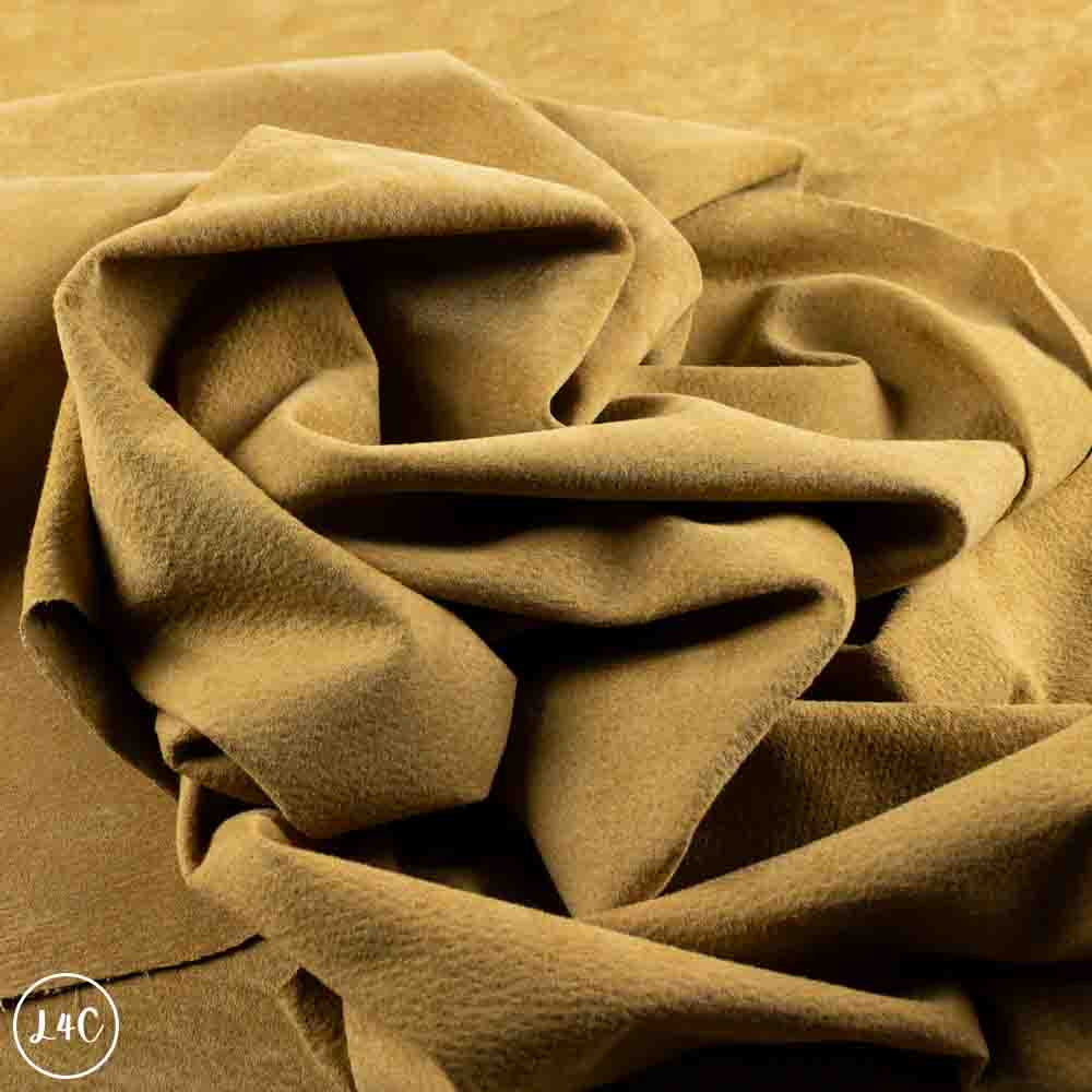Close-up of brown fabric with a soft texture