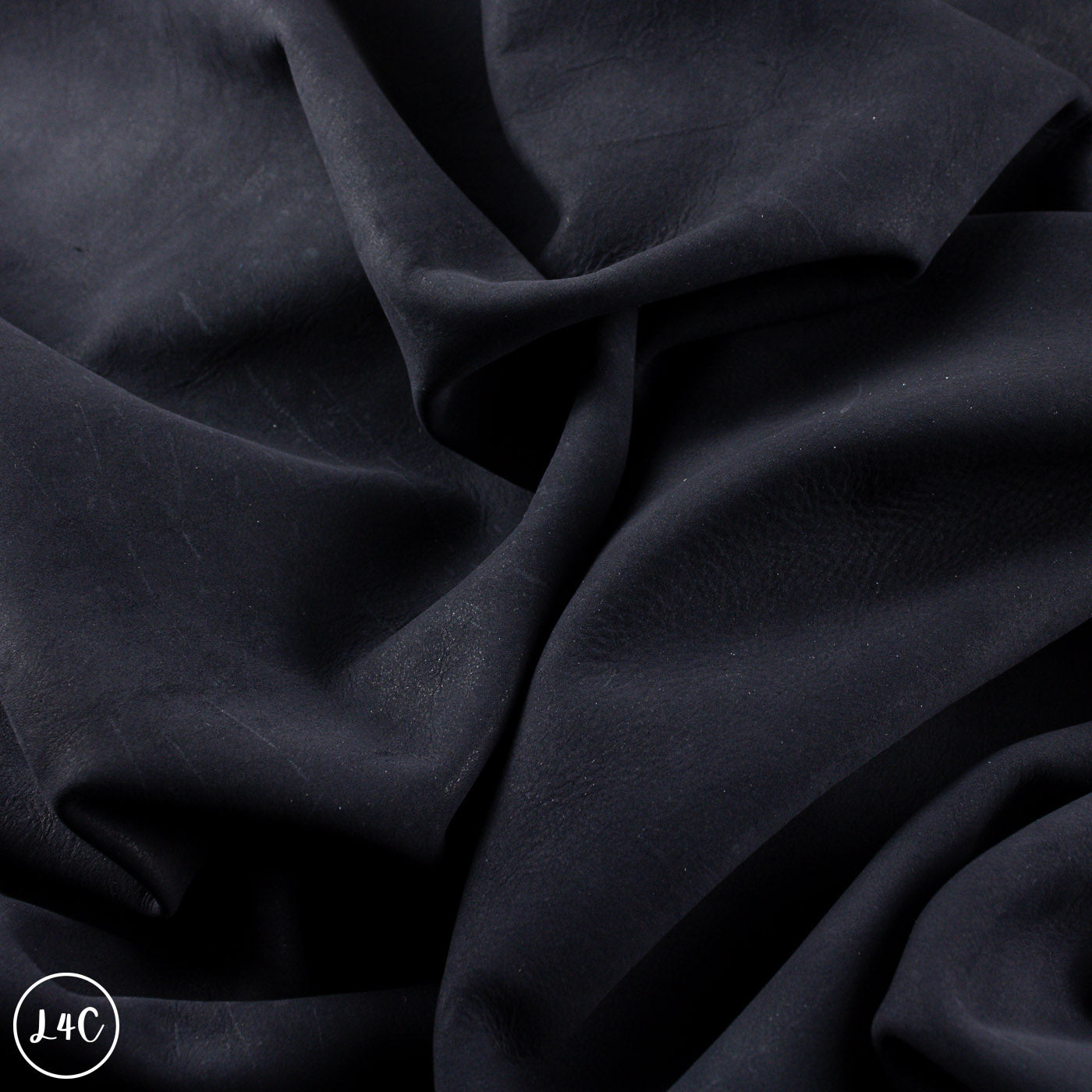 Close-up of dark blue fabric with visible texture