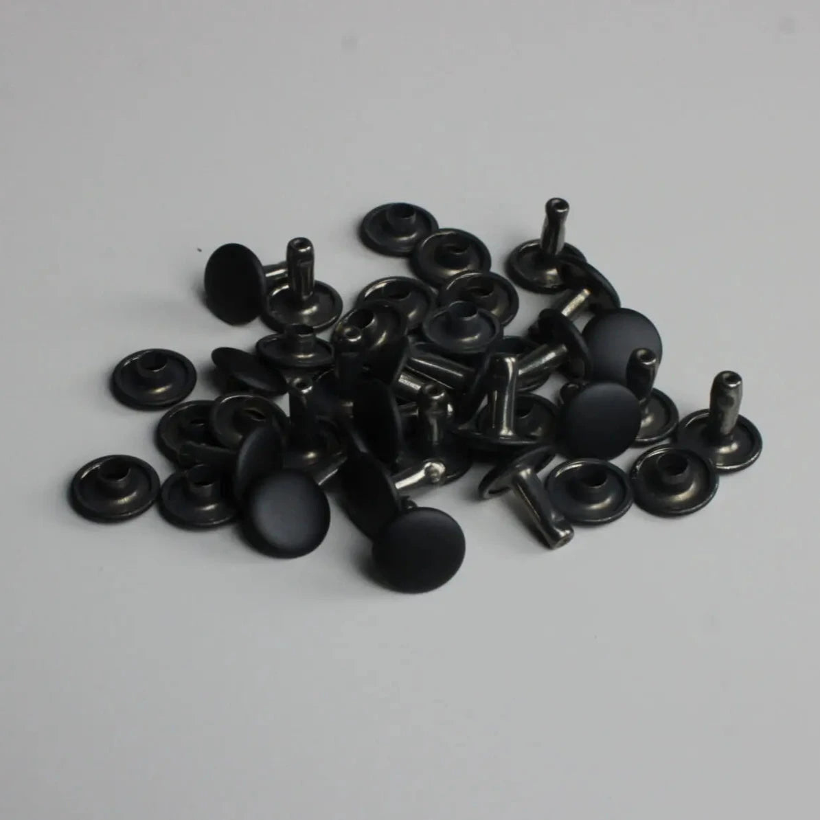 Double Cap Rivets black
