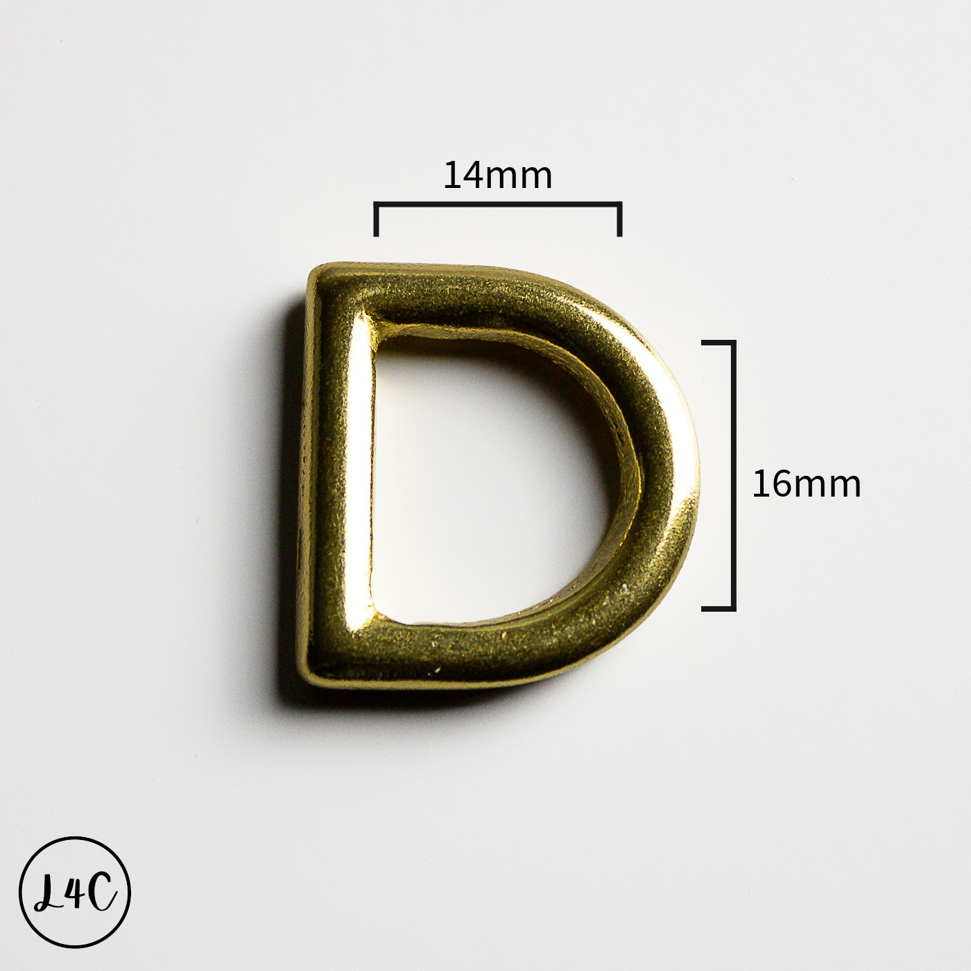 Solid Brass D-ring with measurements on a white background