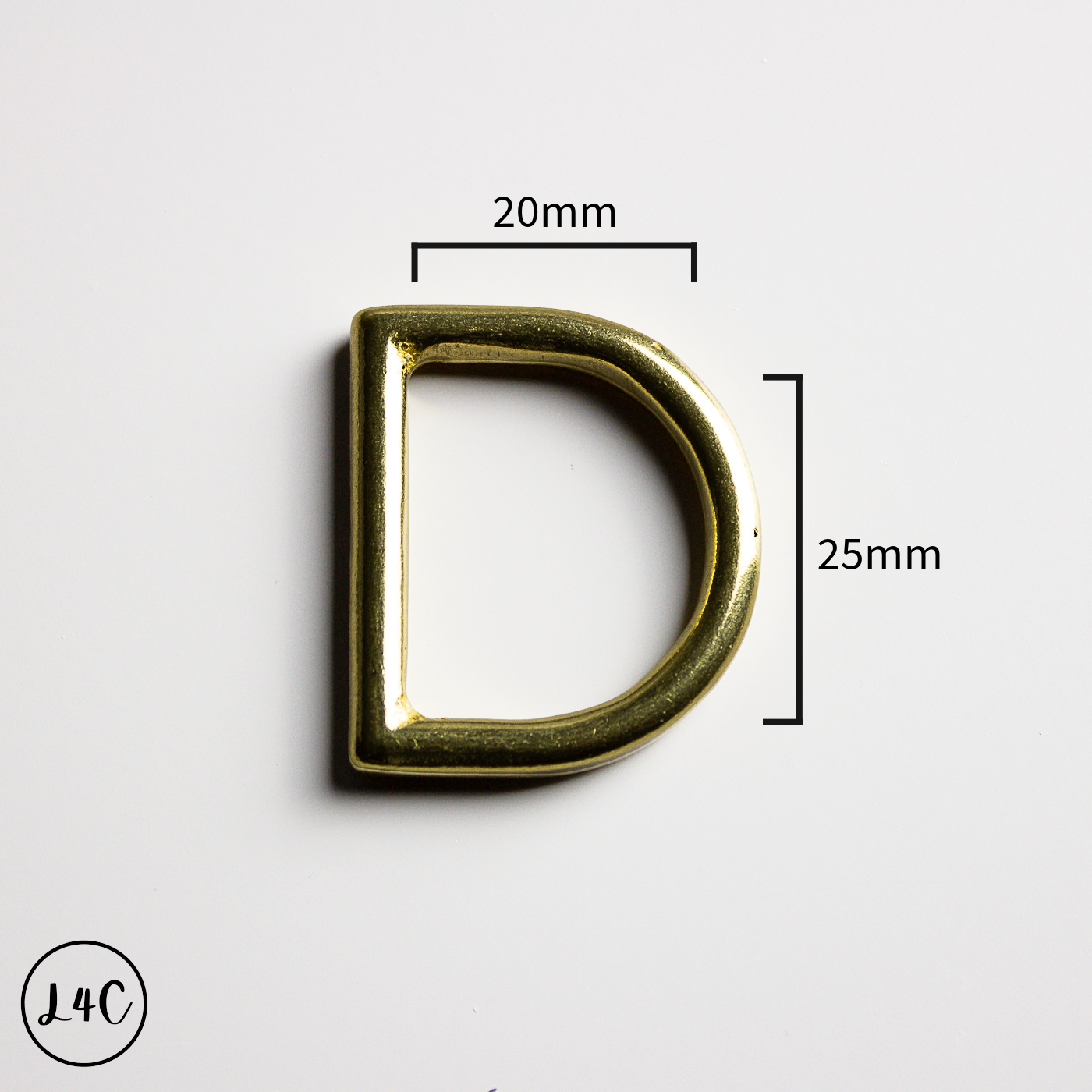 Solid Brass D-ring with measurements on a white background