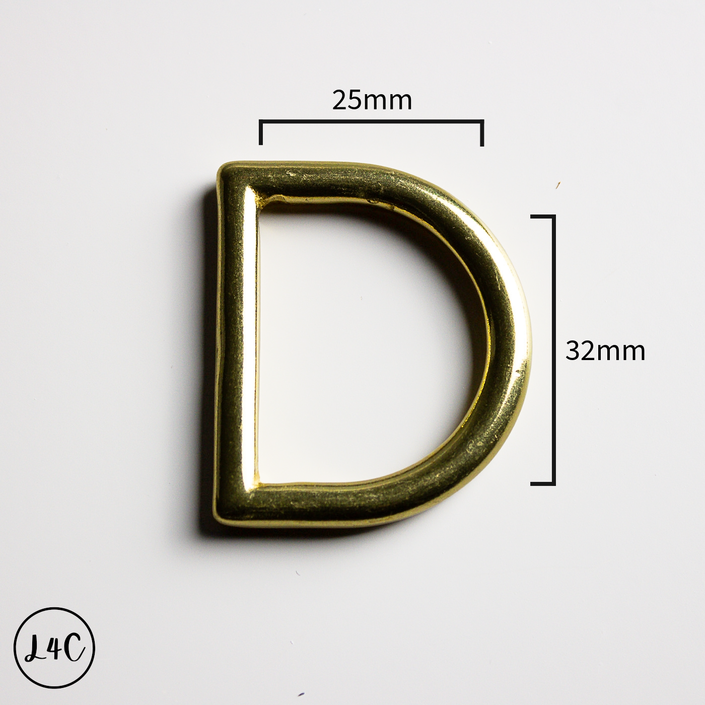 Solid Brass D-ring with measurements on a white background