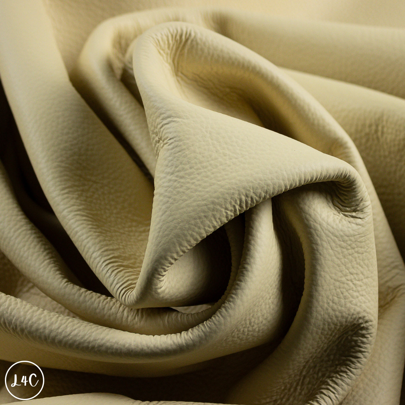 Close-up of beige leather with a soft texture