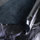 Close-up of dark gray lamb nappa with full grain 