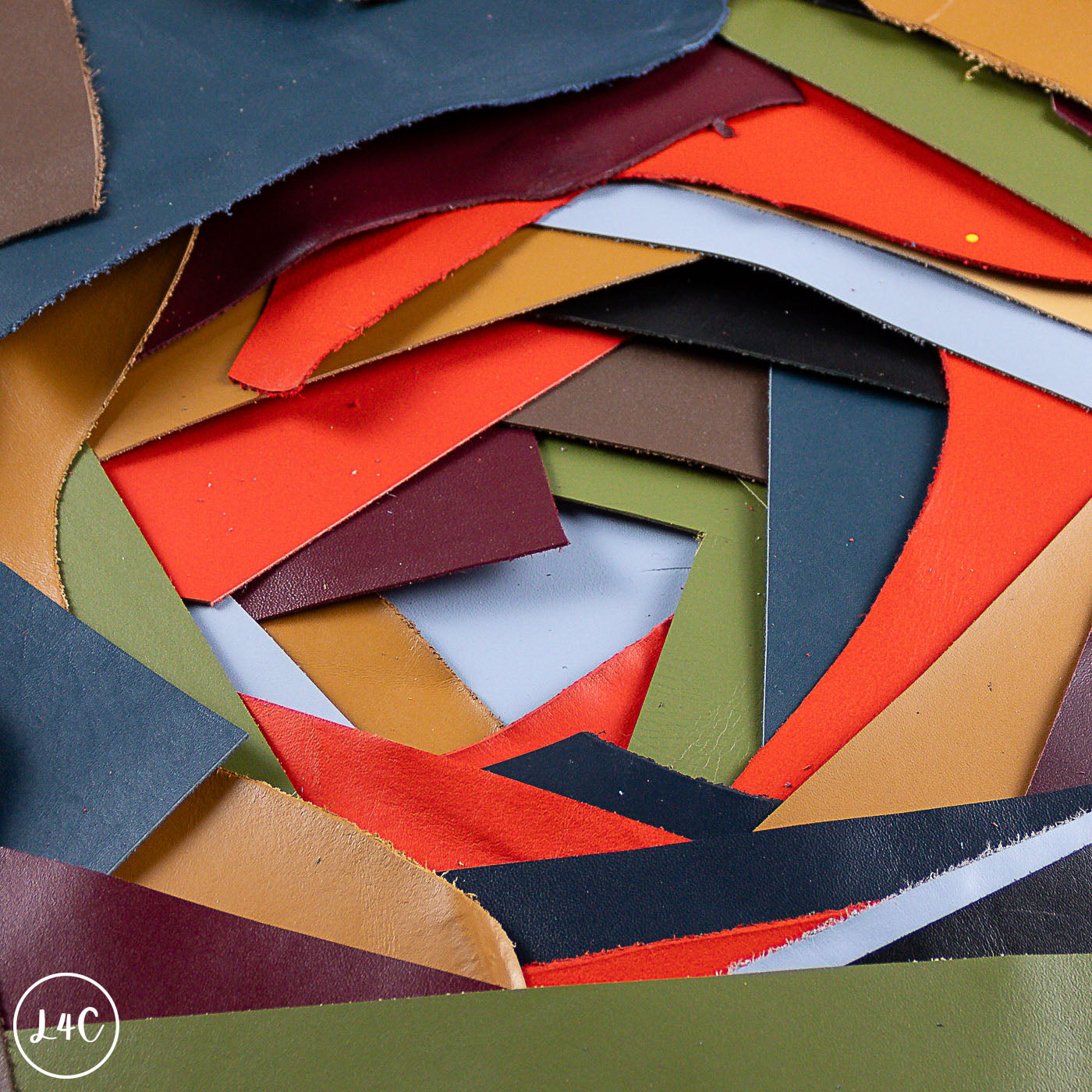 Stack of multicolored leather calf off cuts