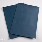 Two blue calf leather panels on a white background