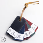 Set of four ciccilia leather samples on a string with a brand logo in the corner.