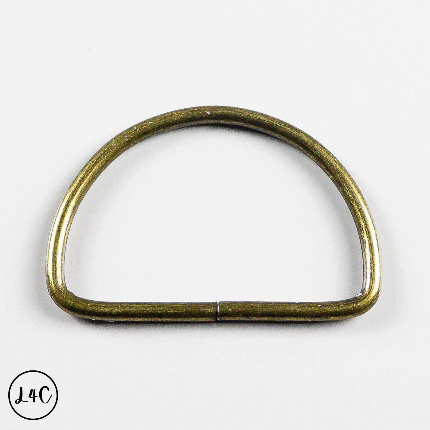 Bronze D-ring on a white background