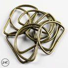 Bronze metal rings on a white background