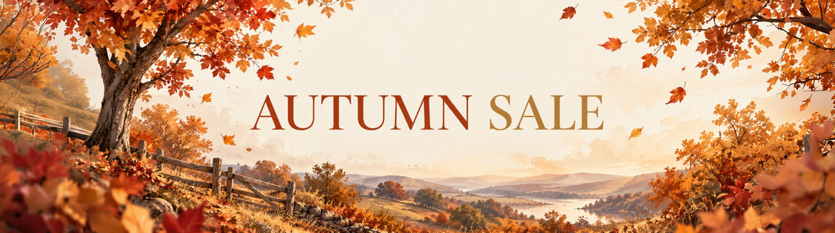 An autumn-themed promotional banner with the words 'AUTUMN SALE' in large serif letters over a warm landscape scene. The background shows orange and yellow fall foliage, a tree on the left, rolling hills, and a soft glowing sky.