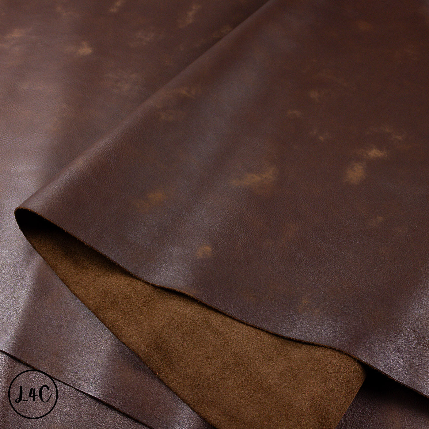 Brown leather hide with a subtle texture and colour variation.