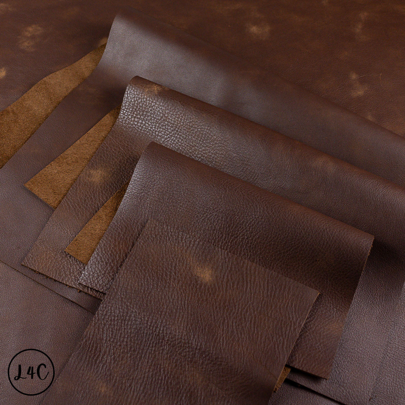 Brown leather hide with visible texture on a brown background
