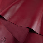 Close-up of red leather hide with visible texture