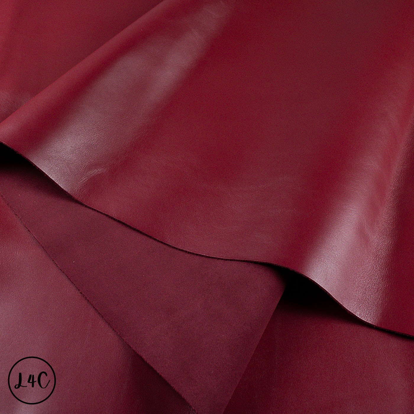 Close-up of red leather hide with visible texture