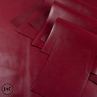 Red leather panels arranged on a red background.