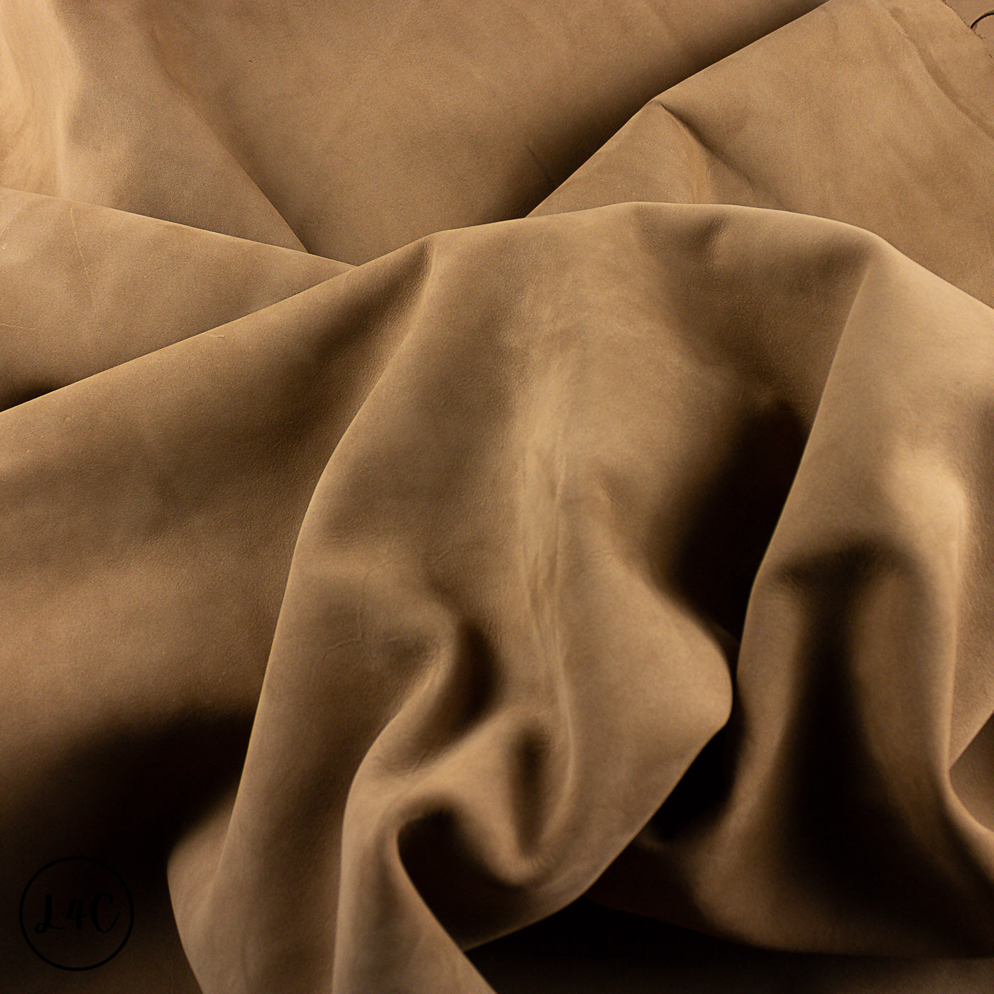 Close-up of brown leather hide with folds