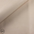 Beige leather fabric with a slight texture