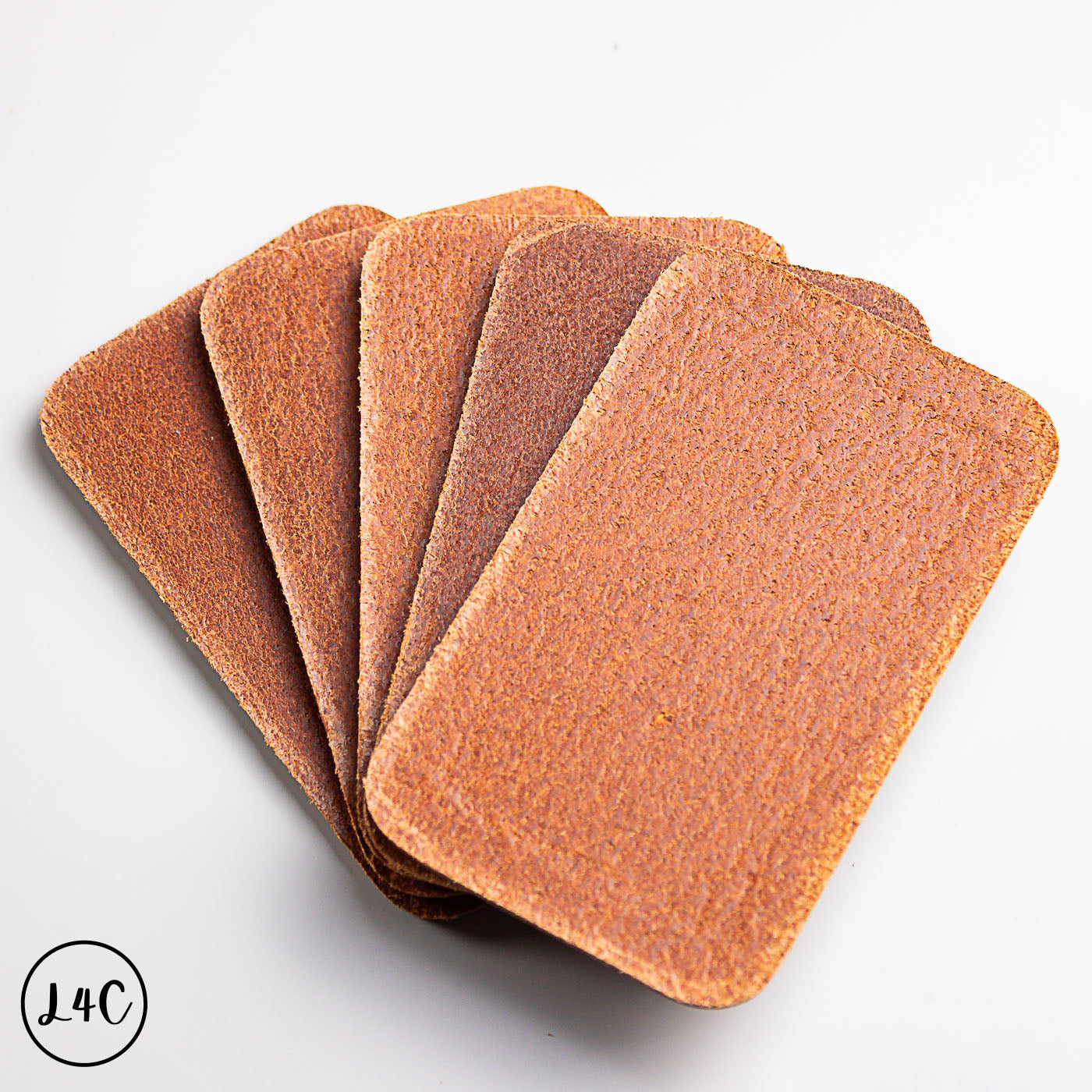 Set of Leather Labelswith varying grits on a white background