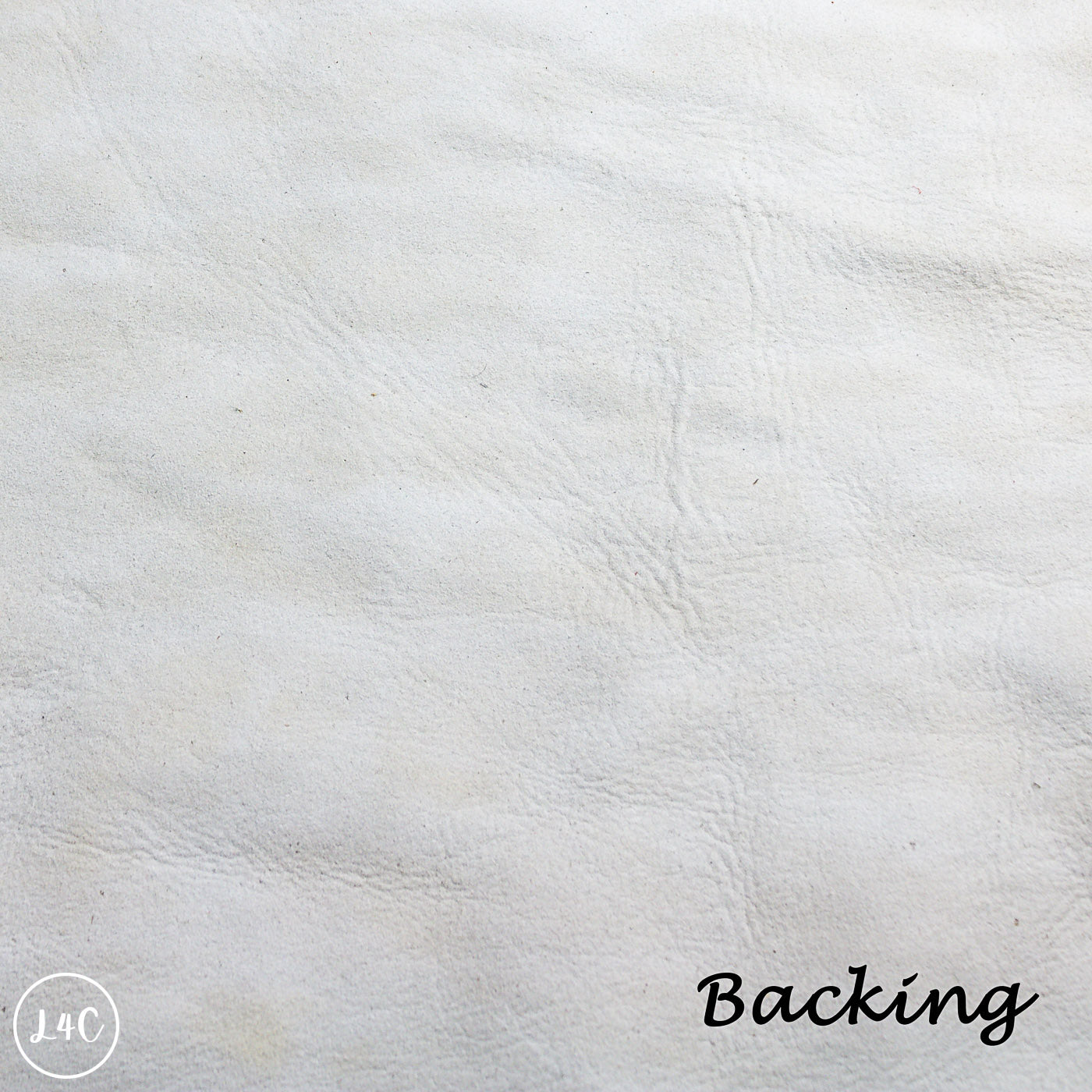 Close-up of white leather texture with 'Backing' text