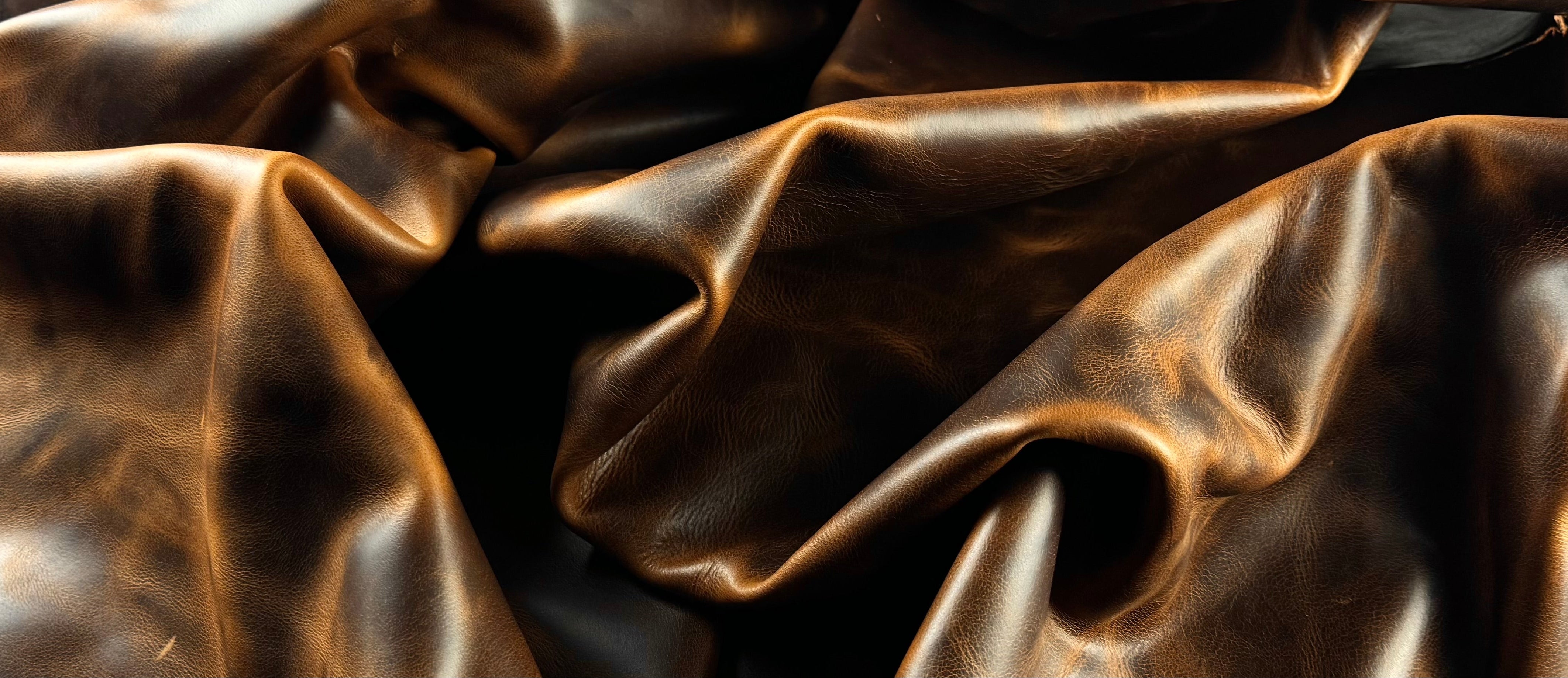 Close-up of brown leather with folds