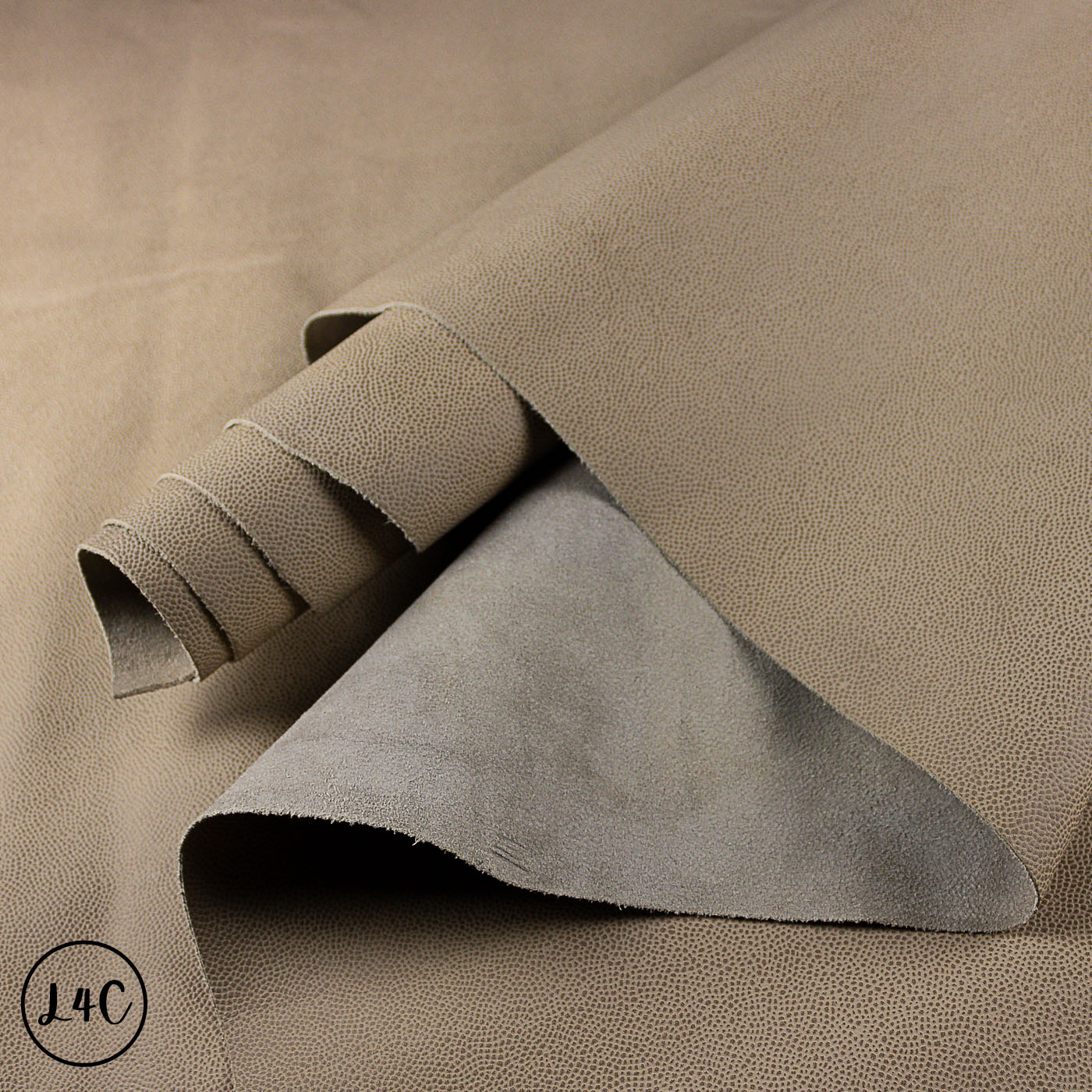 Close-up of beige Tipped Epsom Grain Leather Hide with a textured surface 