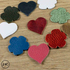 Assorted Leather Hearts & Flowers close up