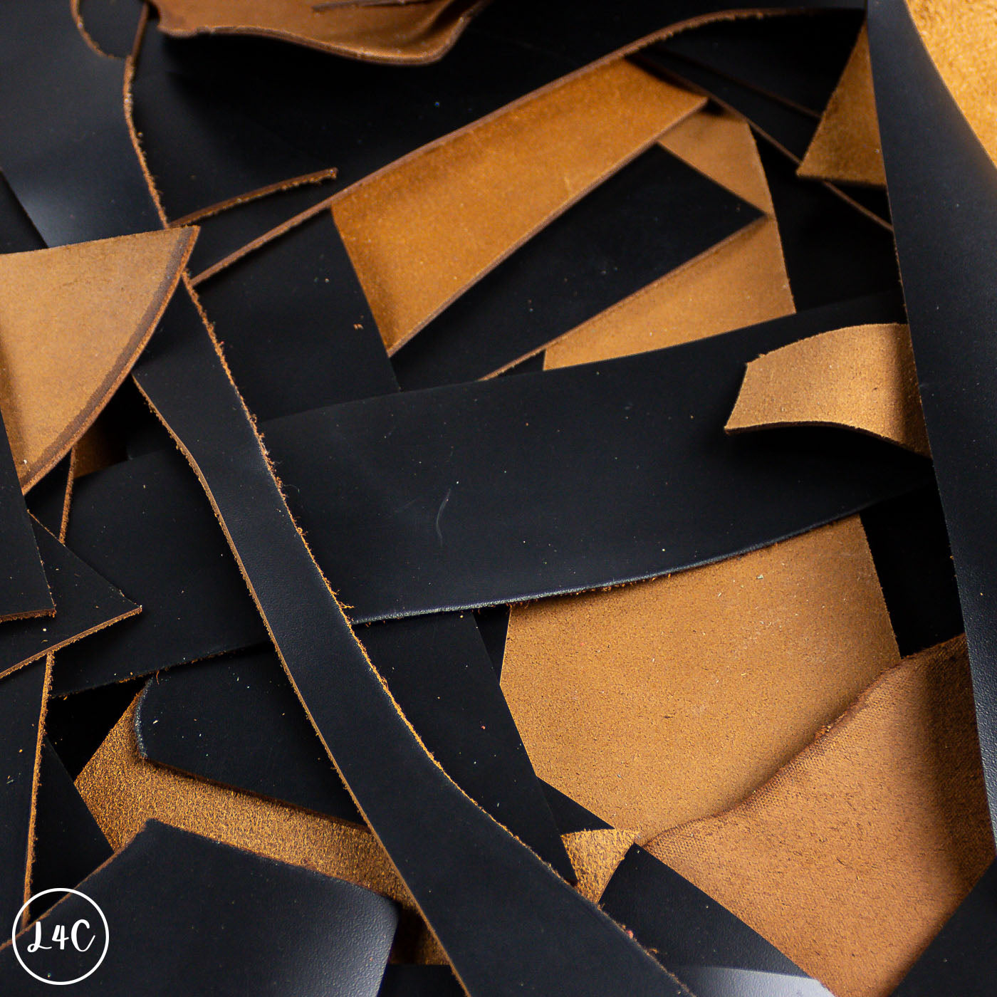 Close-up of black and brown leather scraps
