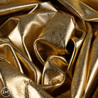 Close-up of crumpled gold metallic fabric