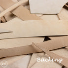 Close-up of natural leather strips with 'Backing' text overlay