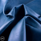Close-up of ocean blue leather hide with folds
