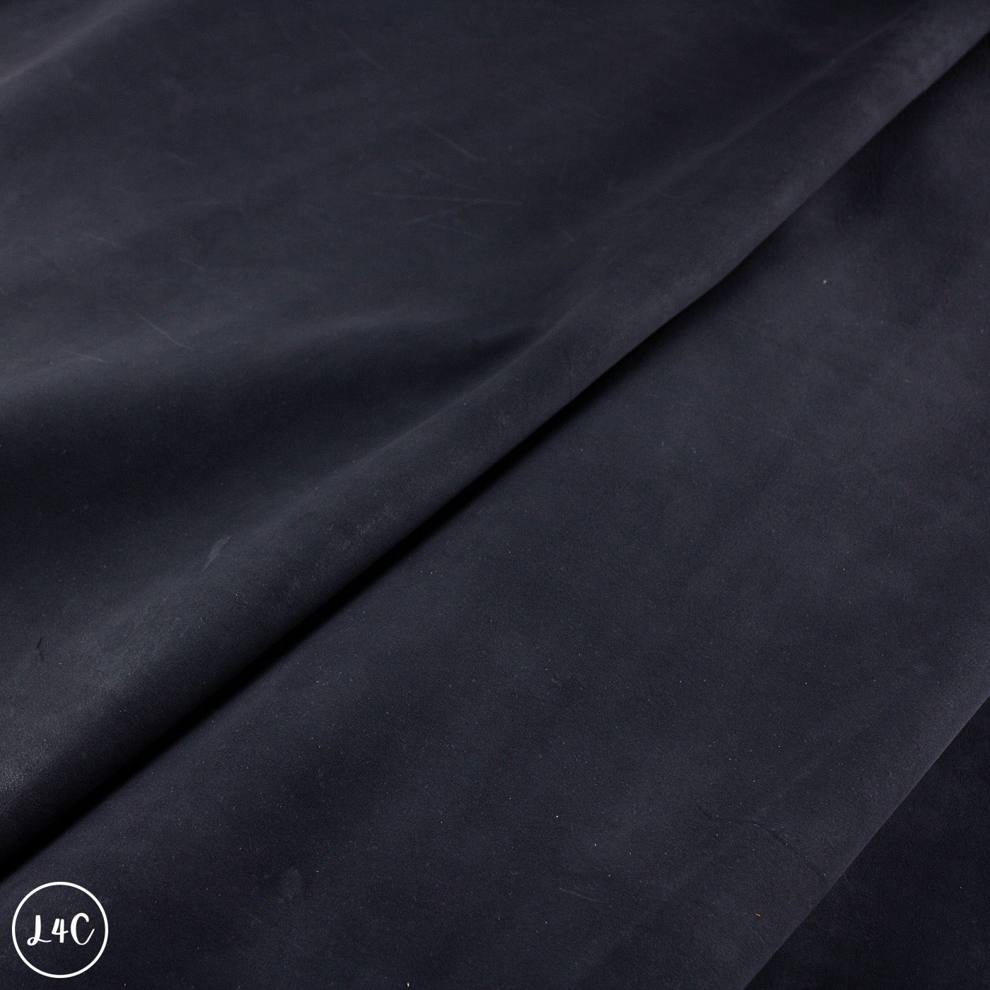 Dark blue fabric with a subtle texture