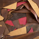 Close-up of assorted leather pieces in various colors.