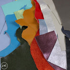 Collection of fairground leather off in various colors and textures.