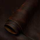 Close-up of brown leather fabric with visible texture