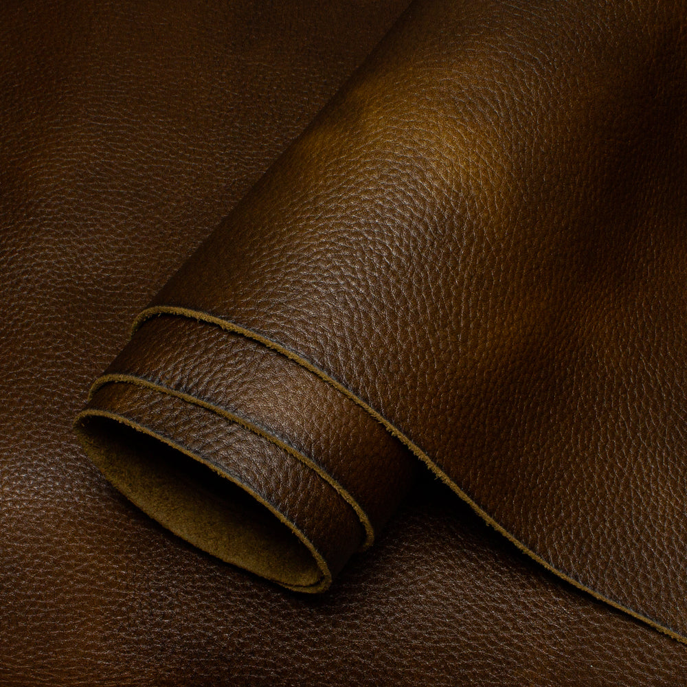 Close-up of brown leather with a visible grain texture