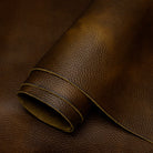 Close-up of brown leather with a visible grain texture