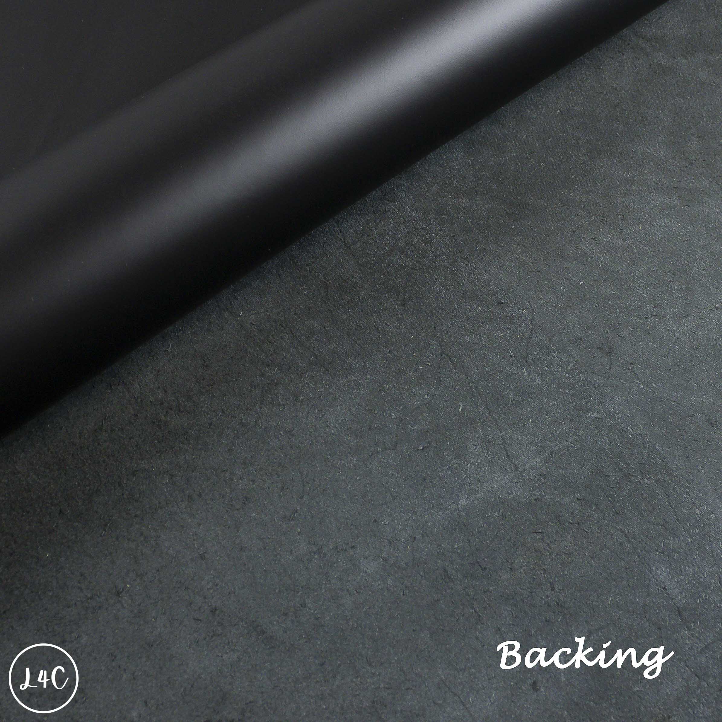 Black leather backing