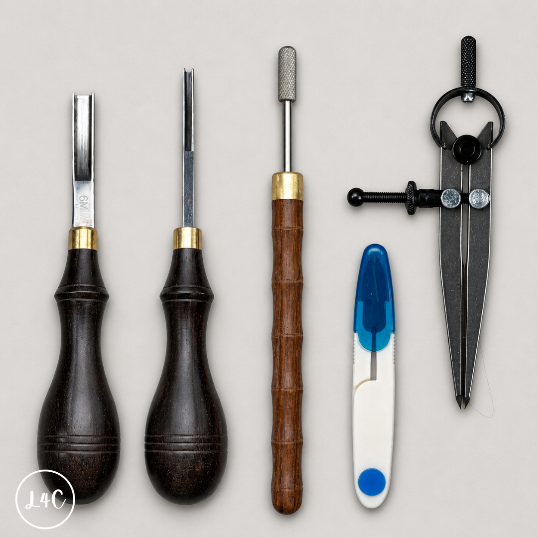 Set of tools including chisels and a knife on a gray background