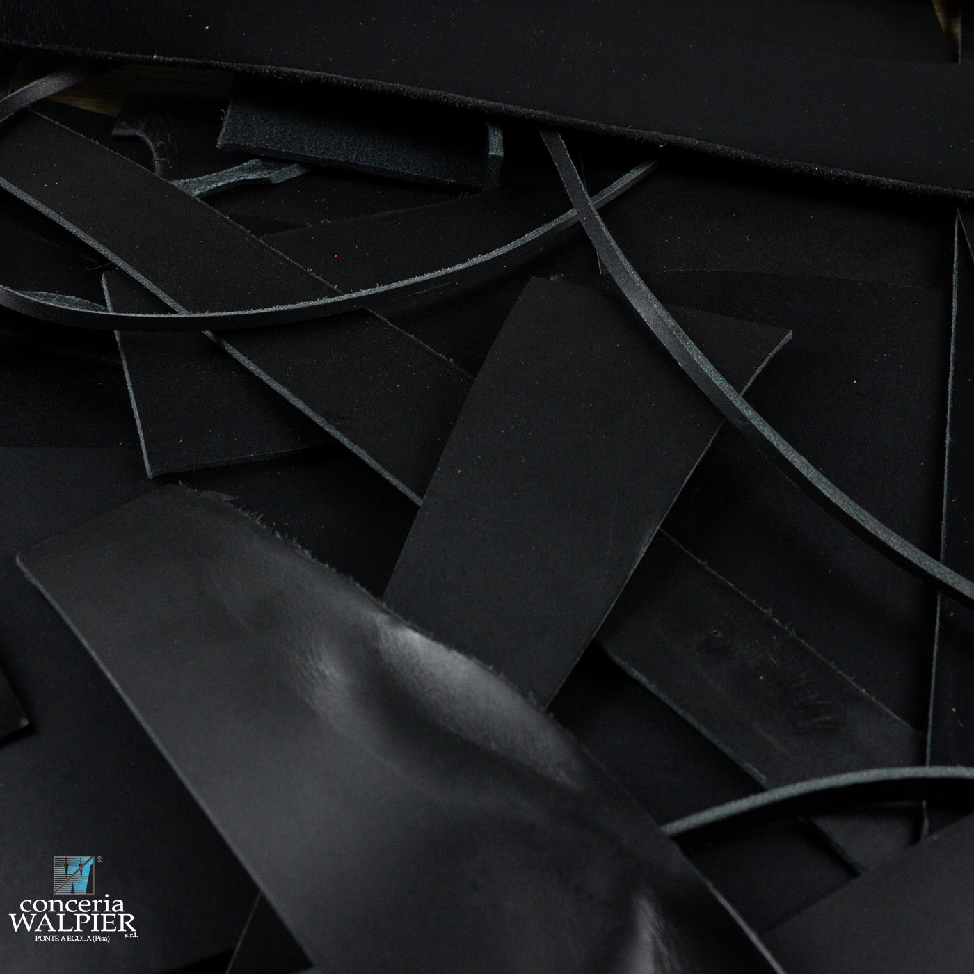 Close-up of black walpier rocky leather off cuts.